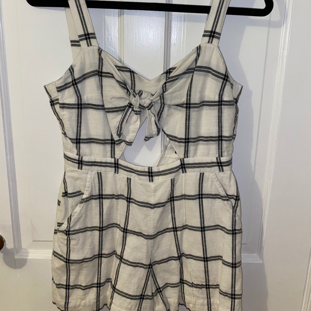 White and black striped romper.